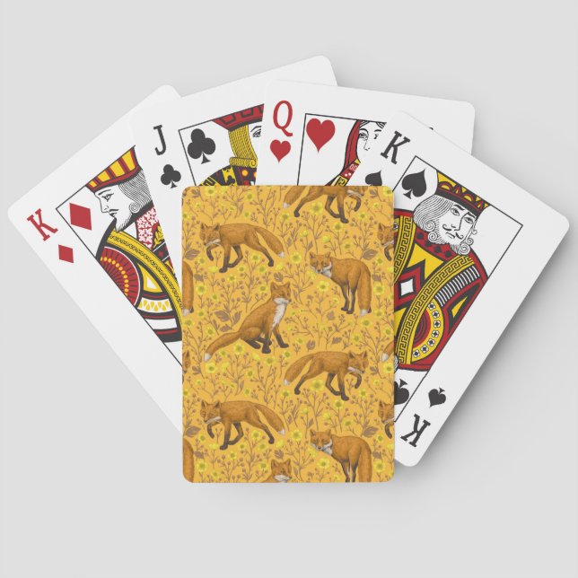 Foxes and buttercups on orange playing cards (Back)