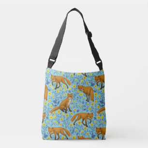 Foxes and buttercups on pool blue crossbody bag