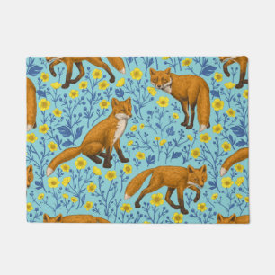 Foxes and buttercups on pool blue doormat