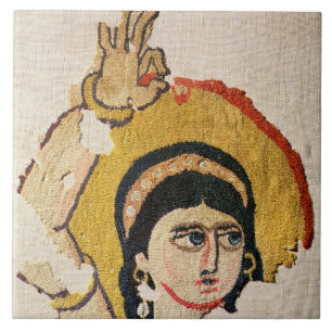 Fragment of a tapestry depicting the head of a dan tile