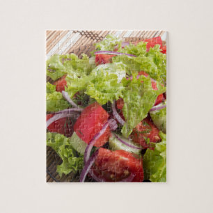 Fragment of vegetarian salad from fresh vegetables jigsaw puzzle