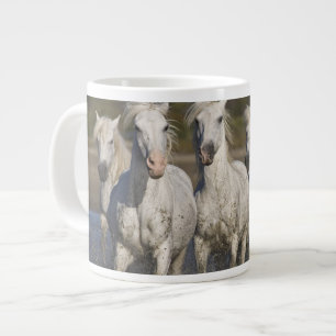 France, Camargue. Horses run Large Coffee Mug