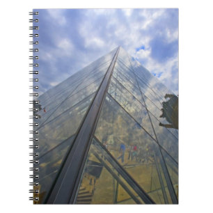 France, Paris. Clouds reflect off the Louvre Spiral Notebook