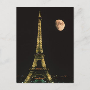 France, Paris. Eiffel Tower at night with Postcard
