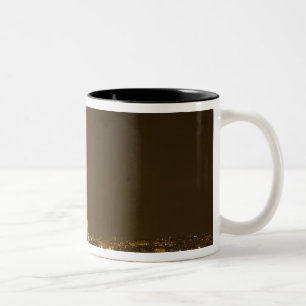 France, Paris. Nighttime view of Eiffel Tower Two-Tone Coffee Mug