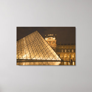 France, Paris. The Louvre at twilight. Credit Canvas Print