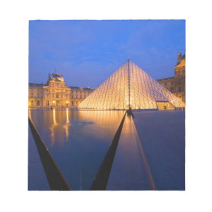 France, Paris. The Louvre museum at twilight. Notepad