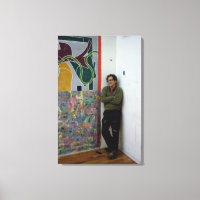Frank Stella  beside one of his works