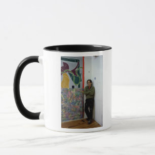 Frank Stella beside one of his works Mug