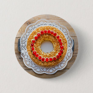 Frankfurt crown cake with cherries on rustic wood 6 cm round badge