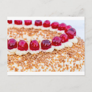 Frankfurt crown cake with cherries on rustic wood postcard
