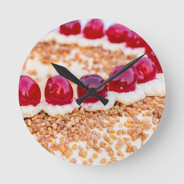 Frankfurt crown cake with cherries on rustic wood round clock (Front)