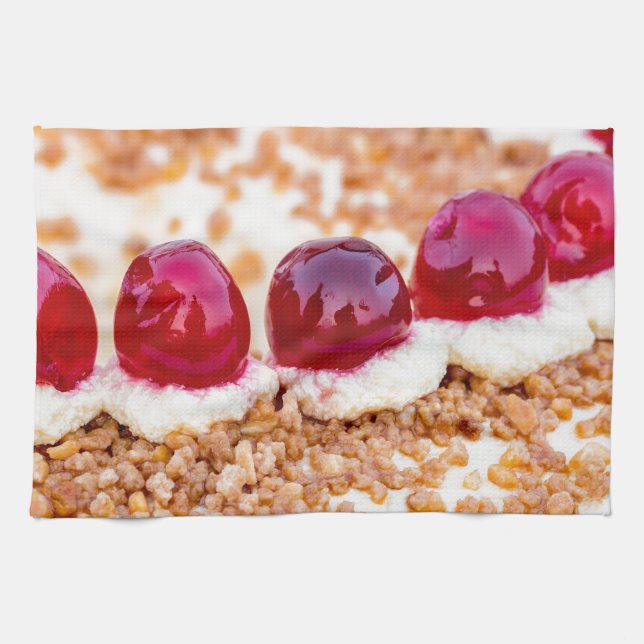 Frankfurt crown cake with cherries on rustic wood tea towel (Horizontal)