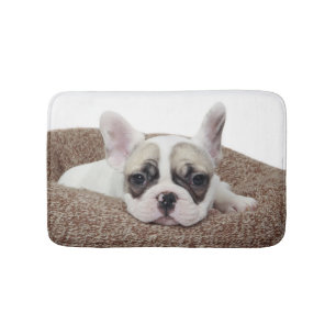 French Bulldog Puppy Lying In A Dog Bed Bath Mat