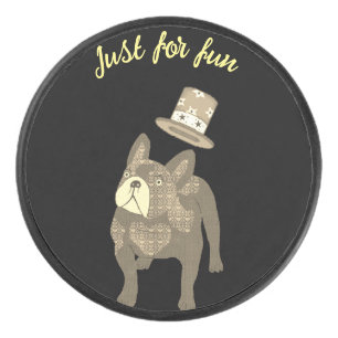 French bulldog with cylinder hockey puck