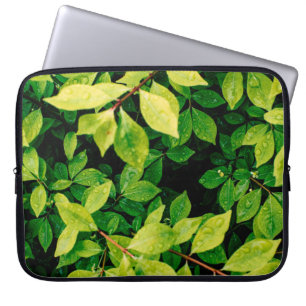 fresh green leaves look beautiful and very natural laptop sleeve