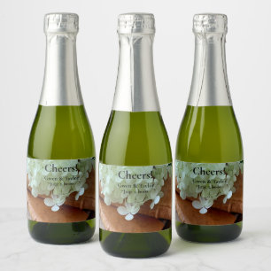 Fresh hydrangeas on old books sparkling wine label