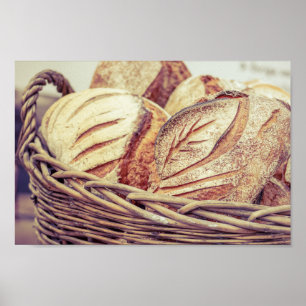 Fresh Loaves of Bread in a Basket Poster