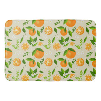 Fresh oranges with flowers and leaves bath mat