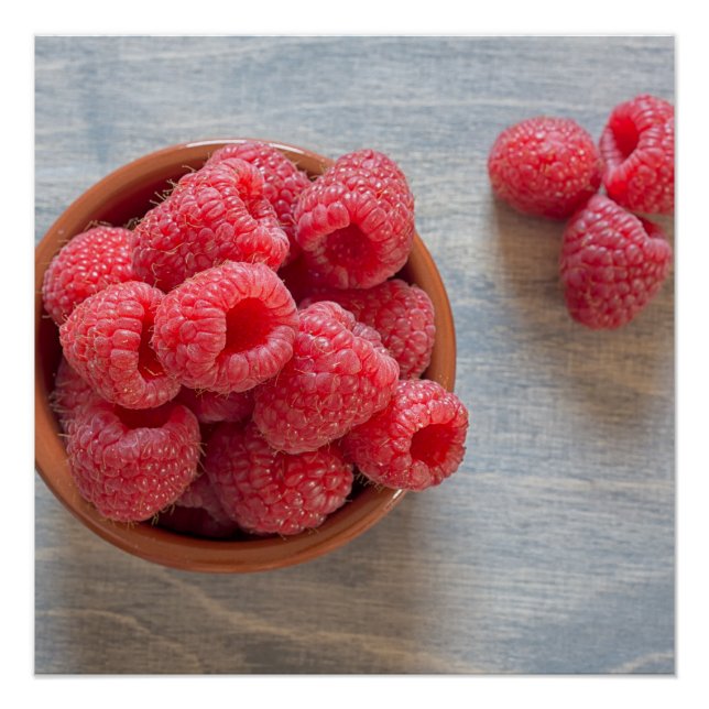 Fresh raspberries in a bowl poster (Front)