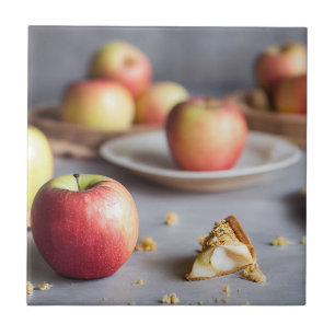 Fresh red apples on the table, apple pie crumbs tile