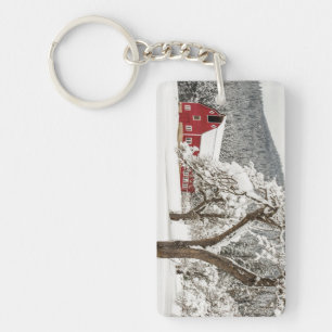 Fresh snow on red barn key ring