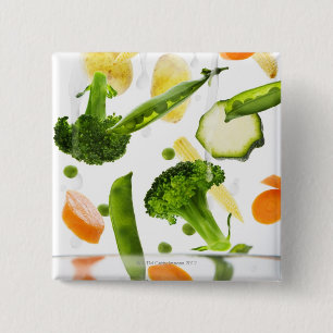 Fresh vegetables with water falling into a bowl 15 cm square badge