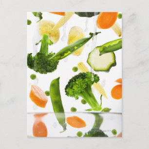 Fresh vegetables with water falling into a bowl postcard