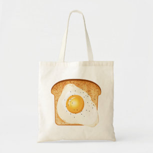 Fried egg on toast tote bag