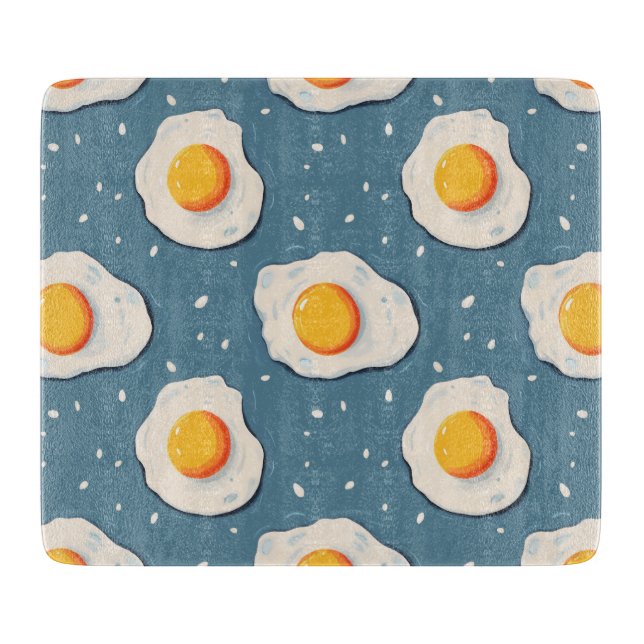 Fried Eggs on Blue Cutting Board (Front)