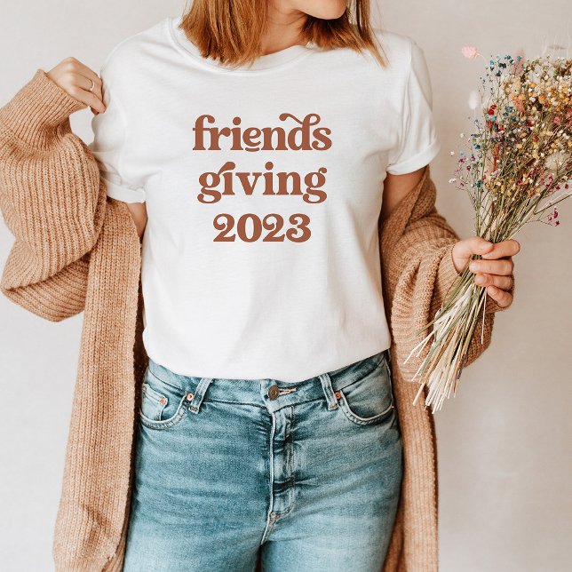 Friendsgiving 2023 | Boho Retro Terracotta T-Shirt (A boho, retro shirt that says "friendsgiving 2023" in terracotta text is perfect to wear to dinner!)