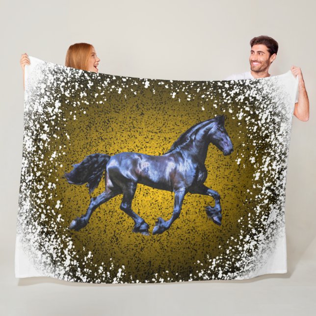 Friesian horse,black stallion trotting,snow gold fleece blanket (In Situ)