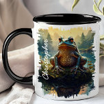 Frog on Rock Forest Mug<br><div class="desc">Delight in the whimsical charm of the Frog on Rock Forest Mug. This unique mug features a vibrant image of a frog perched on a rock in a lush forest setting, with the morning light filtering through the trees. Customised with your name, it adds a personal and playful touch. Perfect...</div>
