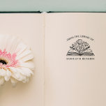 FROM THE LIBRARY OF YOUR NAME OPENED BOOK FLOWERS RUBBER STAMP<br><div class="desc">Elegant bookplate STAMP with your personalised name, perfect for adding a personal touch to your cherished book collection. The bookplate showcases a gracefully curved "From the Library of" inscription at the top, a stunning illustration of an opened book with flower and leaves in the centre. Replace the name below the...</div>