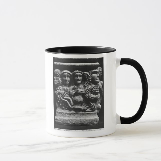 Front of an altar used as a font depicting mug (Right)