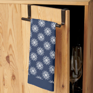Frosty snowflakes on a midnight blue sky tea towel