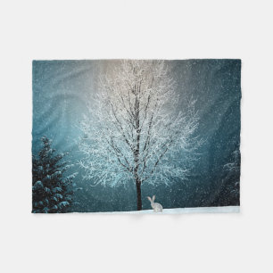 Frosty tree in the evening fleece blanket