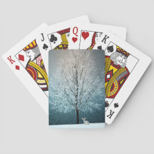 Frosty tree in the evening playing cards