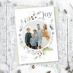 Frosty Watercolor Winter Foliage Wreath Photo Holiday Card<br><div class="desc">This elegant and classic holiday photo card features a beautiful circular watercolor frame of leaves, berries, and other greenery over a simple white background. The greeting on the front says "Joy" in a classic serif font. The back of the card has a simple sage green and white diagonal stripe background,...</div>