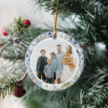 Frosty Winter Foliage Greenery Photo Christmas Ceramic Tree Decoration<br><div class="desc">This elegant and classic holiday photo ornament features a beautiful circular watercolor frame of leaves, berries, and other greenery over a dusty blue background. The botanical illustrations are continued on the back. The greeting on the back is editable and in a classic serif font. There you can add the year...</div>