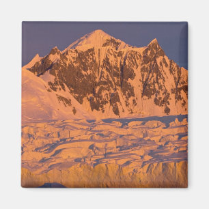 frozen glacial mountain landscape along the magnet