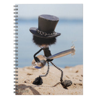 Fubby guitarist with Slash look alike hat. Notebook