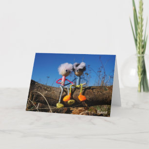 Fubby pair sitting on a trunk together. thank you card