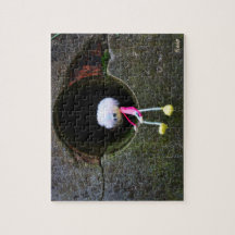 Fubby puppetry sitting in a wall. A cute man