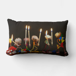 Fubby's walking around festively with candles, fun lumbar cushion