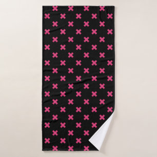 Fuchsia cross stitches on black bath towel