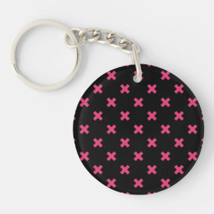 Fuchsia cross stitches on black key ring