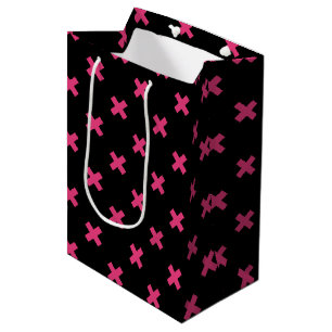 Fuchsia cross stitches on black medium gift bag