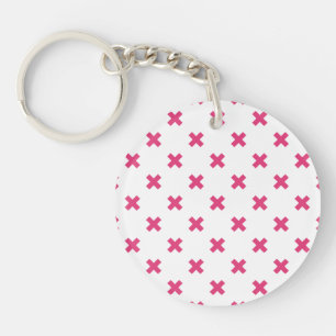 Fuchsia cross stitches on white key ring
