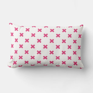 Fuchsia cross stitches on white lumbar cushion
